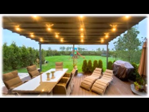 Disfrutando del Ocio al Aire Libre en una Terraza con P&eacute;rgola