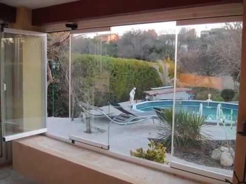 Cortinas de Cristal: La Sensación de Libertad en Tu Hogar